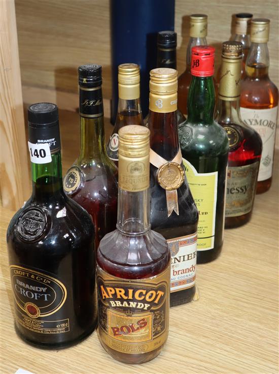 Four assorted whiskies including Teachers, three cognac and four brandys